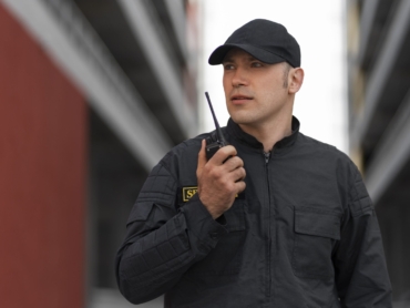 portrait male security guard with radio station min